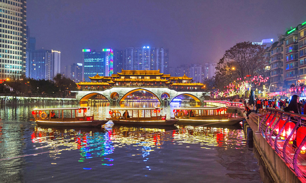 Jinjiang River night cruise passing Anshun Bridge in Chengdu