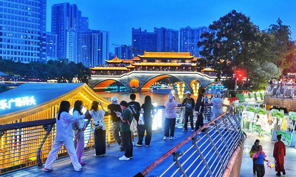 Jiuyan Bridge at night along the Jinjiang River in Chengdu