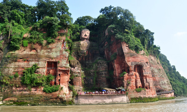 Leshan Giant Buddha carved into a cliff above the river in Sichuan