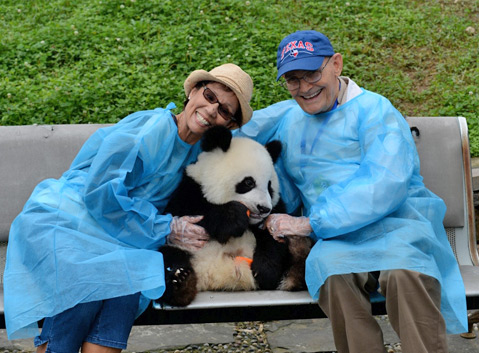 Holding a Giant Panda at Dujiangyan Panda Base