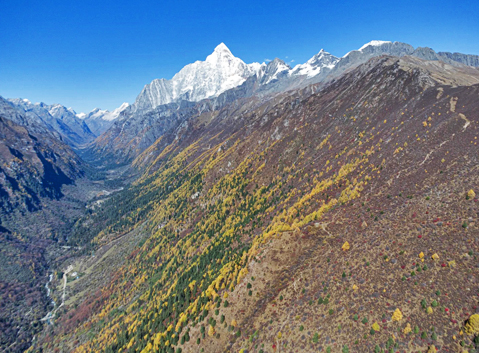 Snow-capped peaks of Mount Siguniang viewed from Haizi Valley