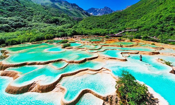Colorful travertine pools at Huanglong Scenic Area in Sichuan