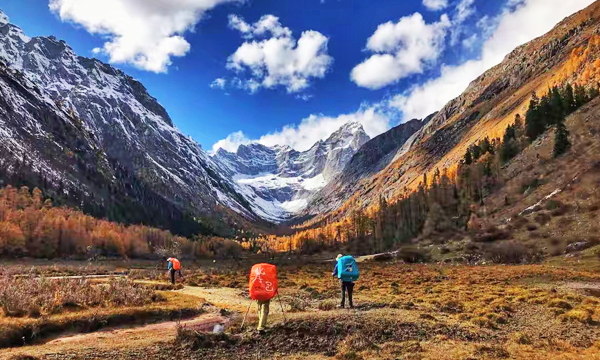Climbers heading toward the high peaks of Mount Siguniang