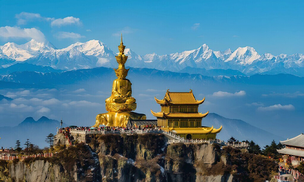 Golden Summit of Mount Emei with snow mountains and sea of clouds