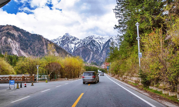 Private car driving on a mountain road from Chengdu to Songpan