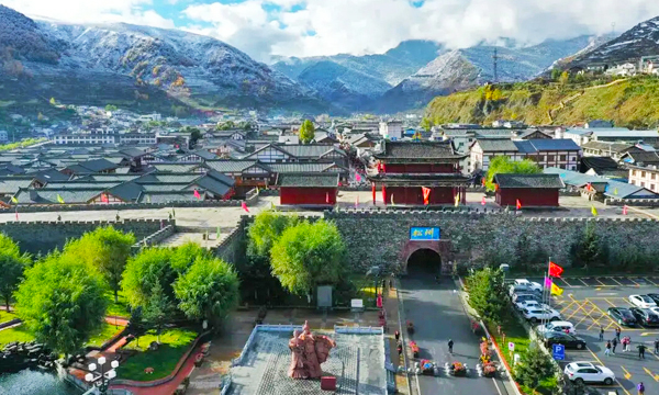 View of Songpan Ancient Town with its historic city walls and surrounding mountains