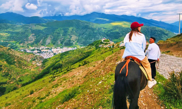 Horse trekking in the mountains above Songpan Ancient Town