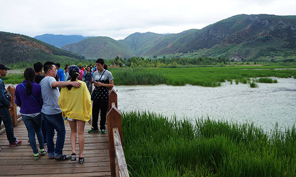 Walking through the Bridge in Lugu Lake.