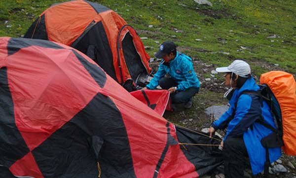 Pitching a Tent at Er Feng Base Camp